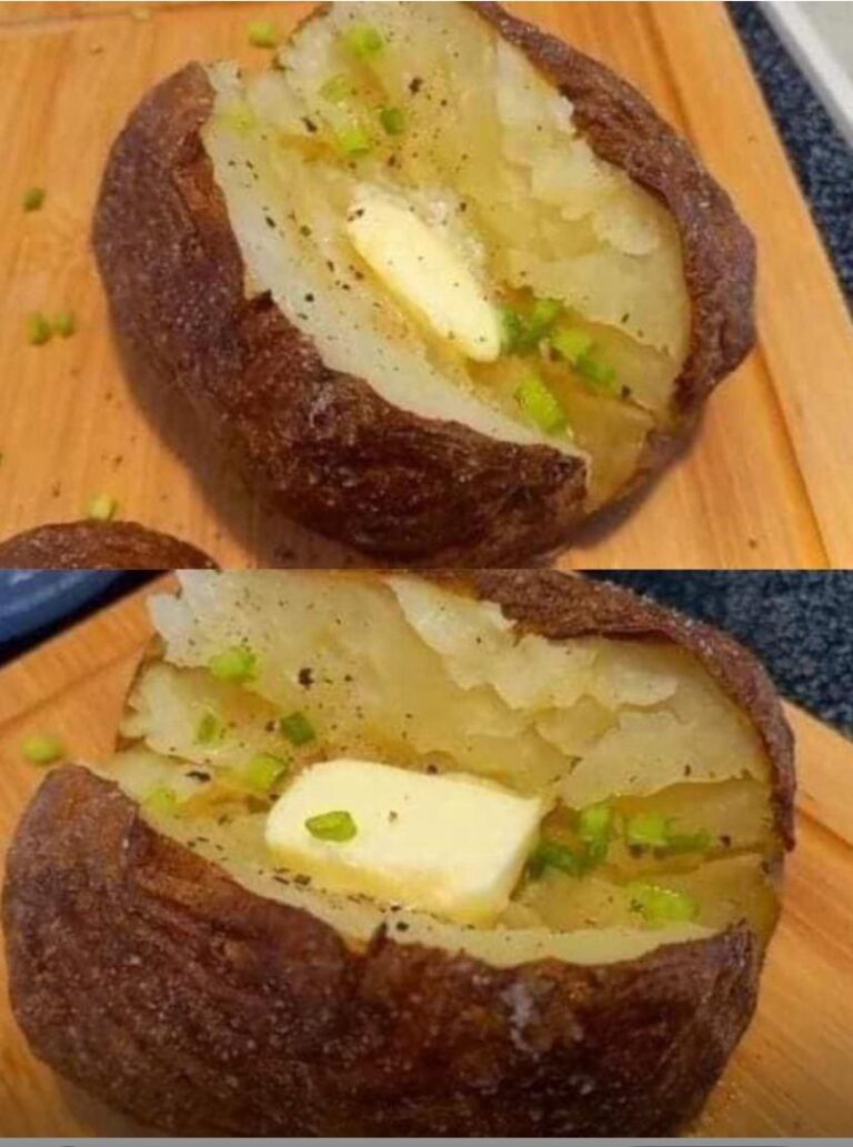 baked potato with butter and chives.